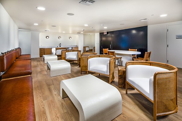 Elegant speakeasy-style clubhouse interior at Be DTLA Apartments offering luxury event space