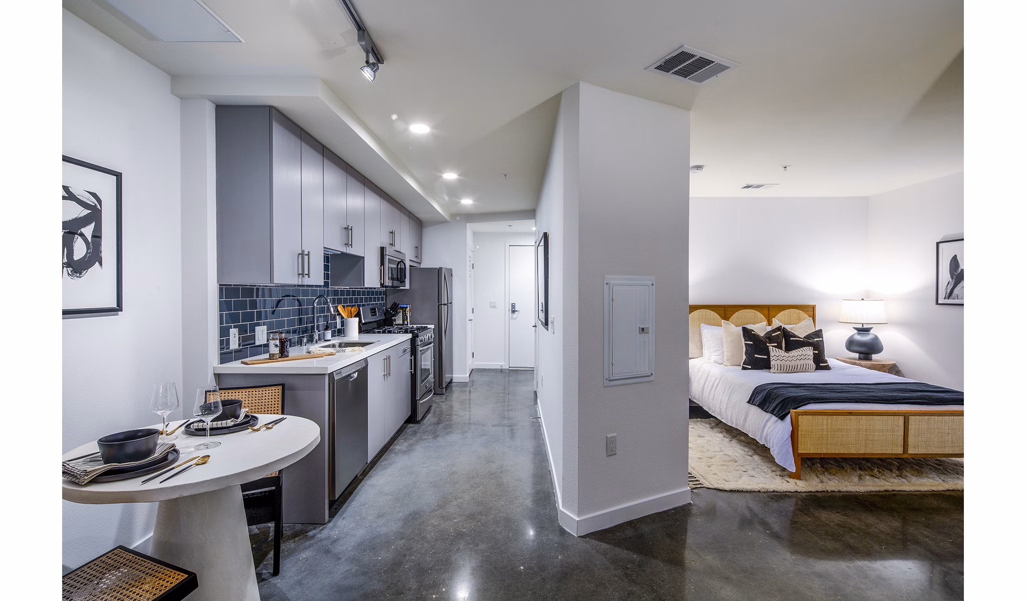 Elegant dining room with modern furnishings at Be DTLA Apartments offering luxury living in Los Angeles