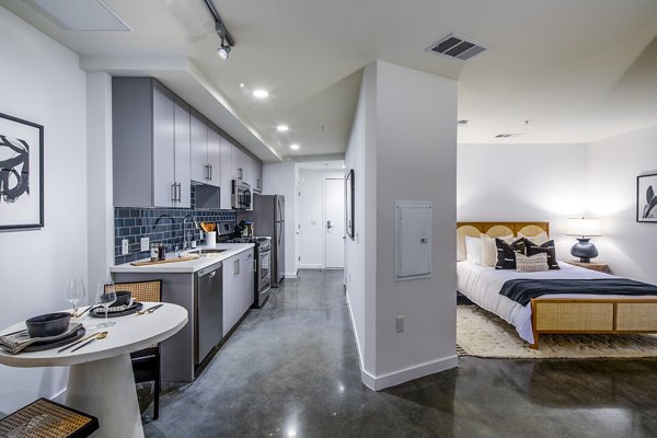 Elegant dining room with modern furnishings at Be DTLA Apartments offering luxury living in Los Angeles