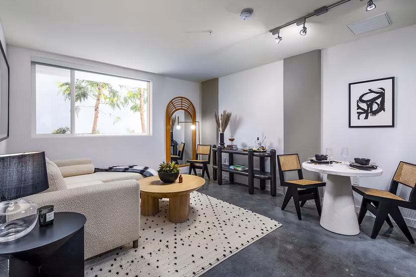 Stylish living room with modern decor at Be DTLA Apartments