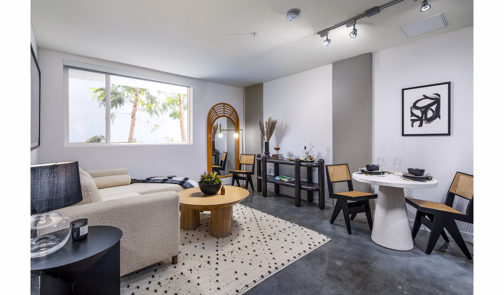 Stylish living room with modern decor at Be DTLA Apartments