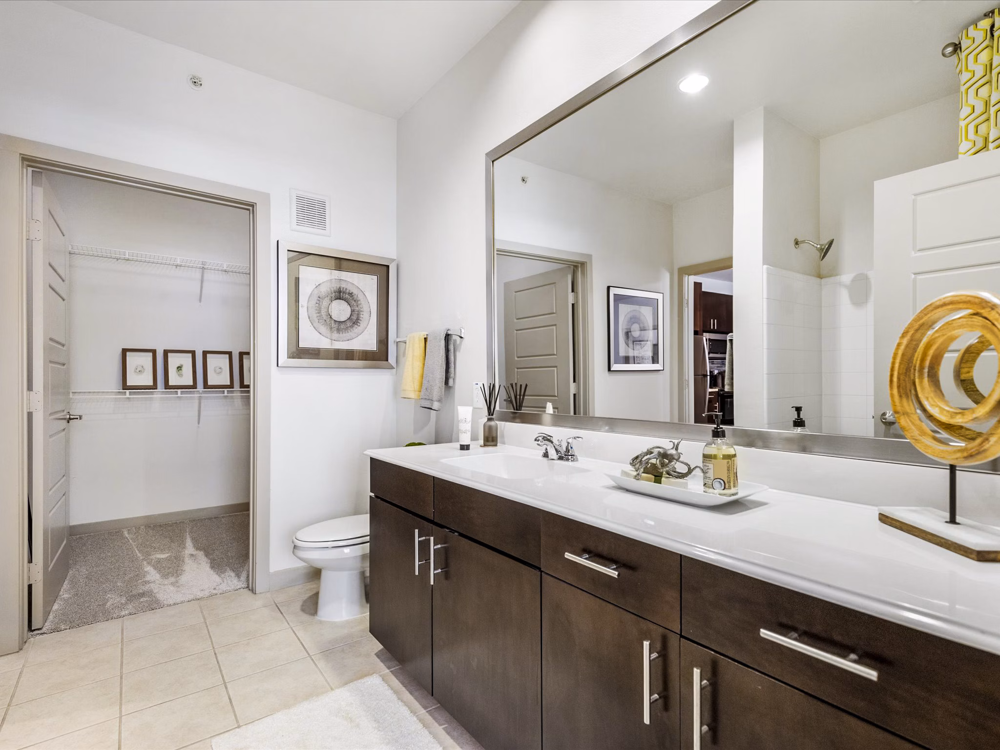 Modern bathroom with elegant fixtures at The Avery on Southwestern Apartments