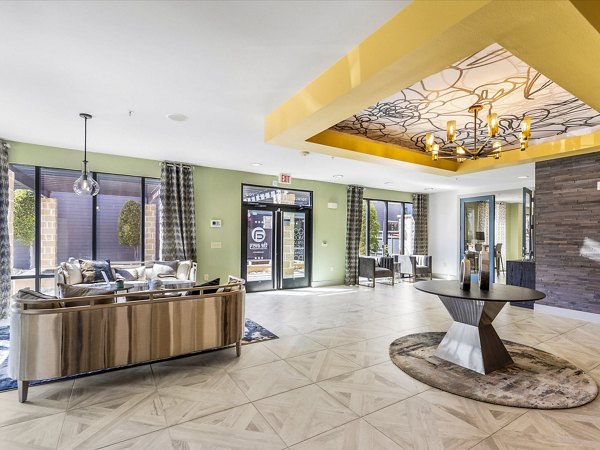Modern clubhouse at The Avery on Southwestern Apartments featuring luxury lounge and entertainment spaces