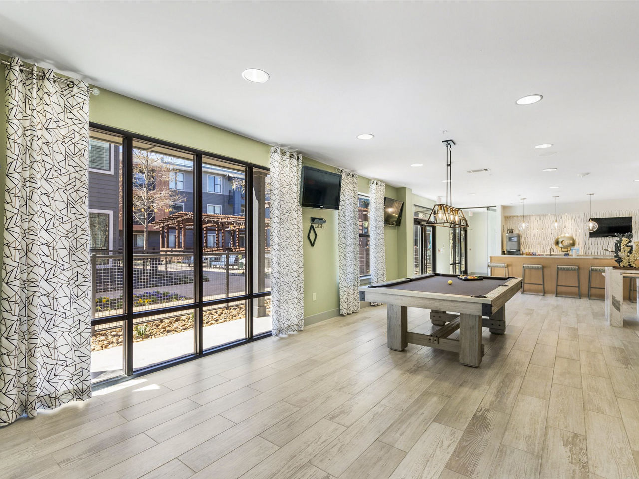 Game room at The Avery On Southwestern