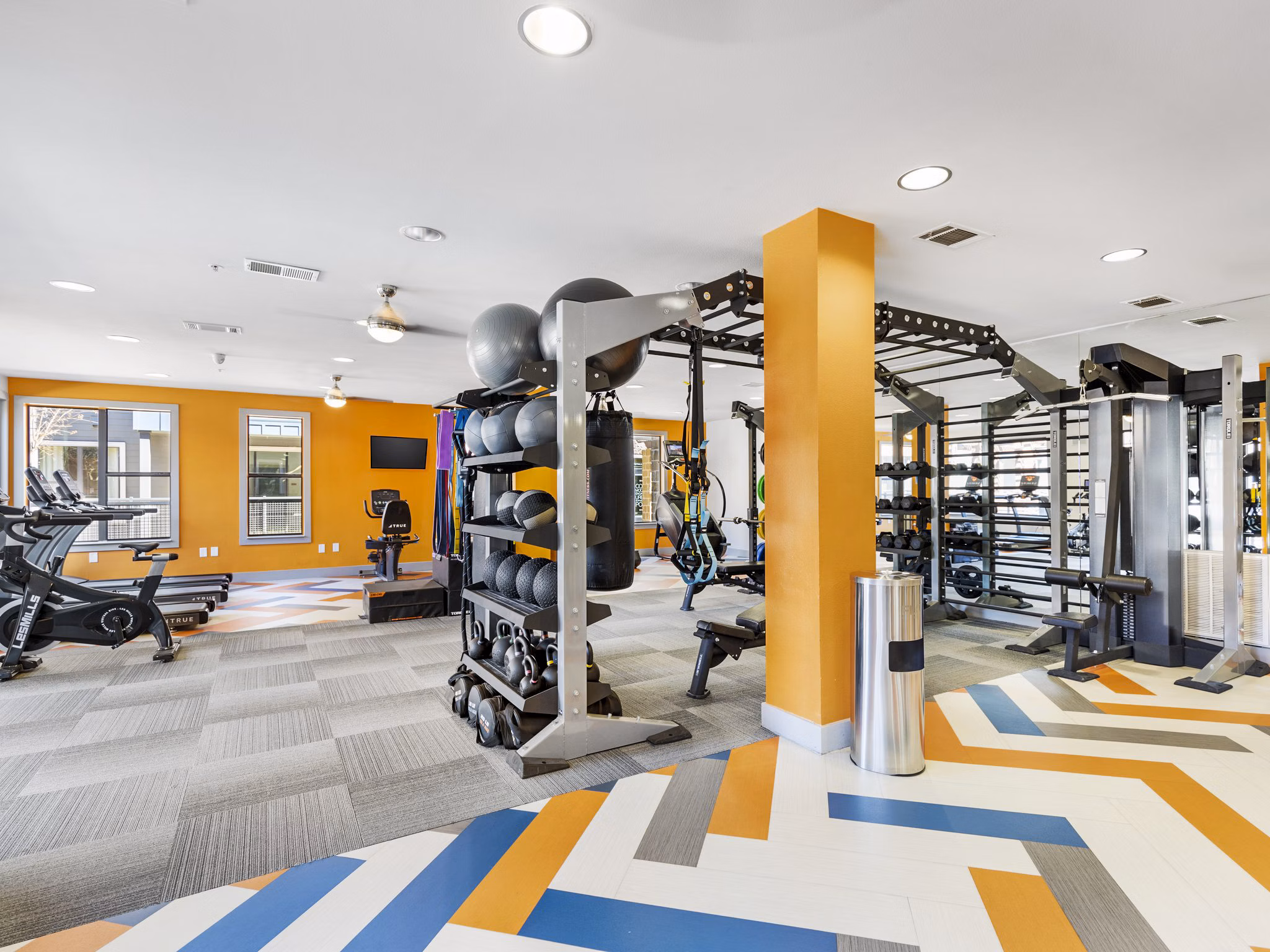 State-of-the-art fitness center with modern equipment at The Avery on Southwestern Apartments