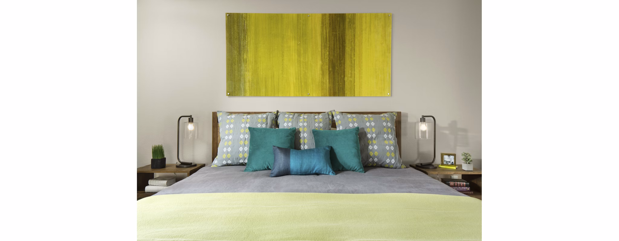 Spacious bedroom with modern decor at Griffis at Lowry Apartments