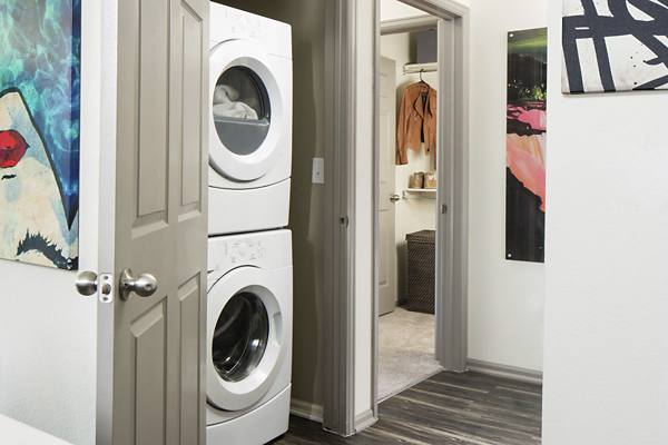 laundry room at Griffis at Lowry Apartments
