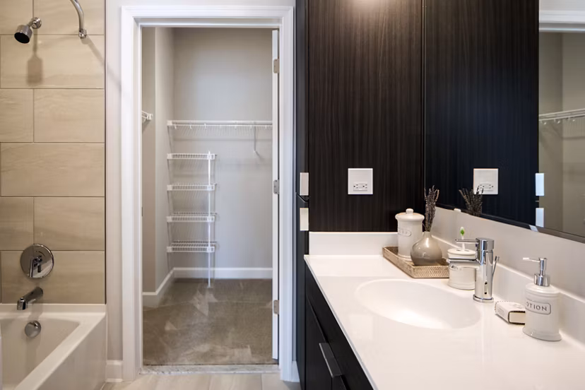 Bathroom featuring modern fixtures and sleek design at Loren Apartments