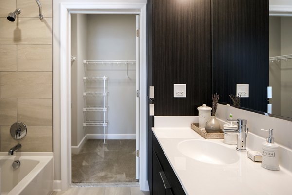 Bathroom featuring modern fixtures and sleek design at Loren Apartments