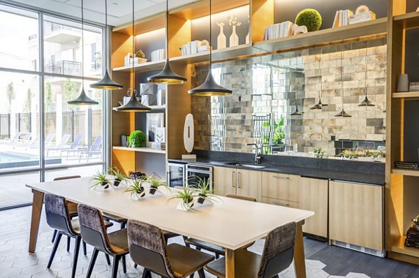Clubhouse featuring modern design and seating areas in Loren Apartments