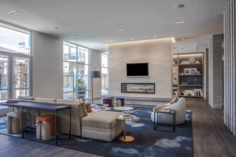 Clubhouse featuring modern design and entertainment areas at Loren Apartments luxury community