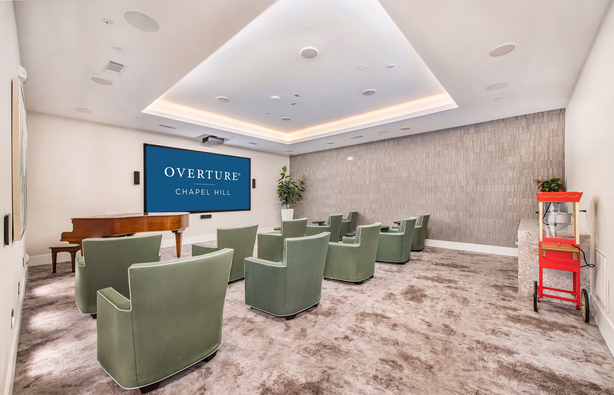 Theater with plush seating at Overture Chapel Hill Apartments