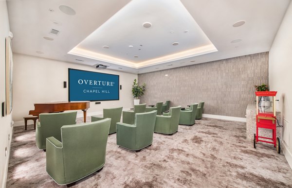 Theater with plush seating at Overture Chapel Hill Apartments