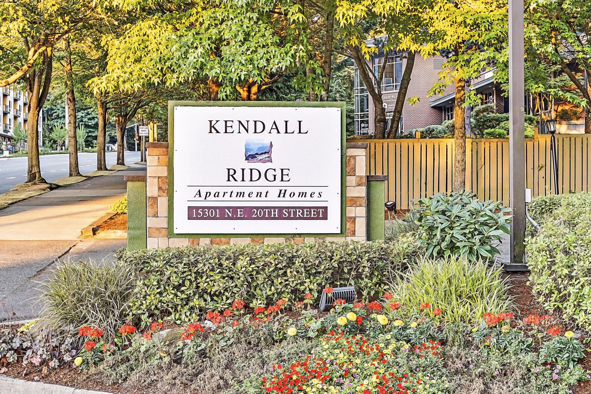 Kendall Ridge Apartments: Signage displaying modern luxury living in an upscale community setting