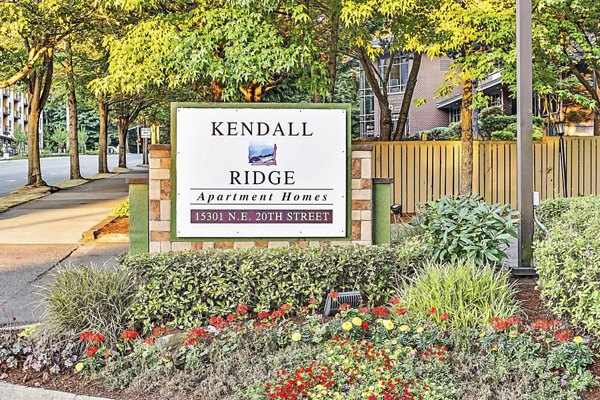 Kendall Ridge Apartments: Signage displaying modern luxury living in an upscale community setting