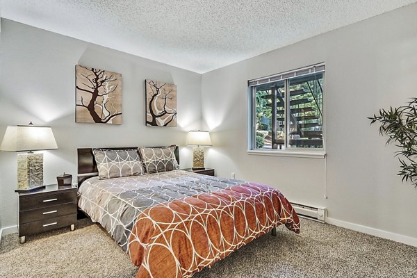 Cozy bedroom with modern furnishings at Kendall Ridge Apartments
