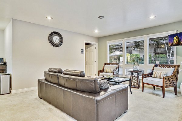 Welcoming clubhouse with modern decor at Kendall Ridge Apartments, perfect for gathering and recreation in a luxury setting