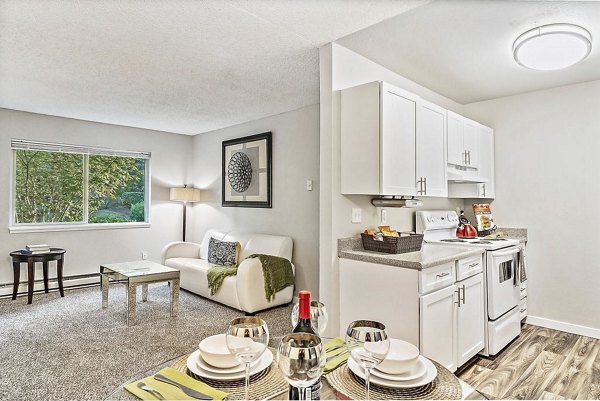 Modern dining area with sleek furnishings at Kendall Ridge Apartments, luxury accommodation by Greystar in prime location