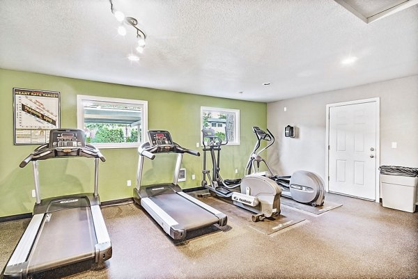 Modern fitness center with state-of-the-art equipment at Kendall Ridge Apartments luxury living community