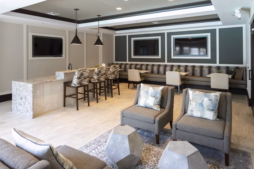 Clubhouse featuring modern design and communal seating at Amorance Apartments in Greystar's luxury apartment collection