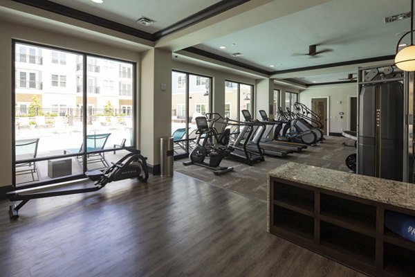 State-of-the-art fitness center at Amorance Apartments, featuring modern equipment and ample workout space