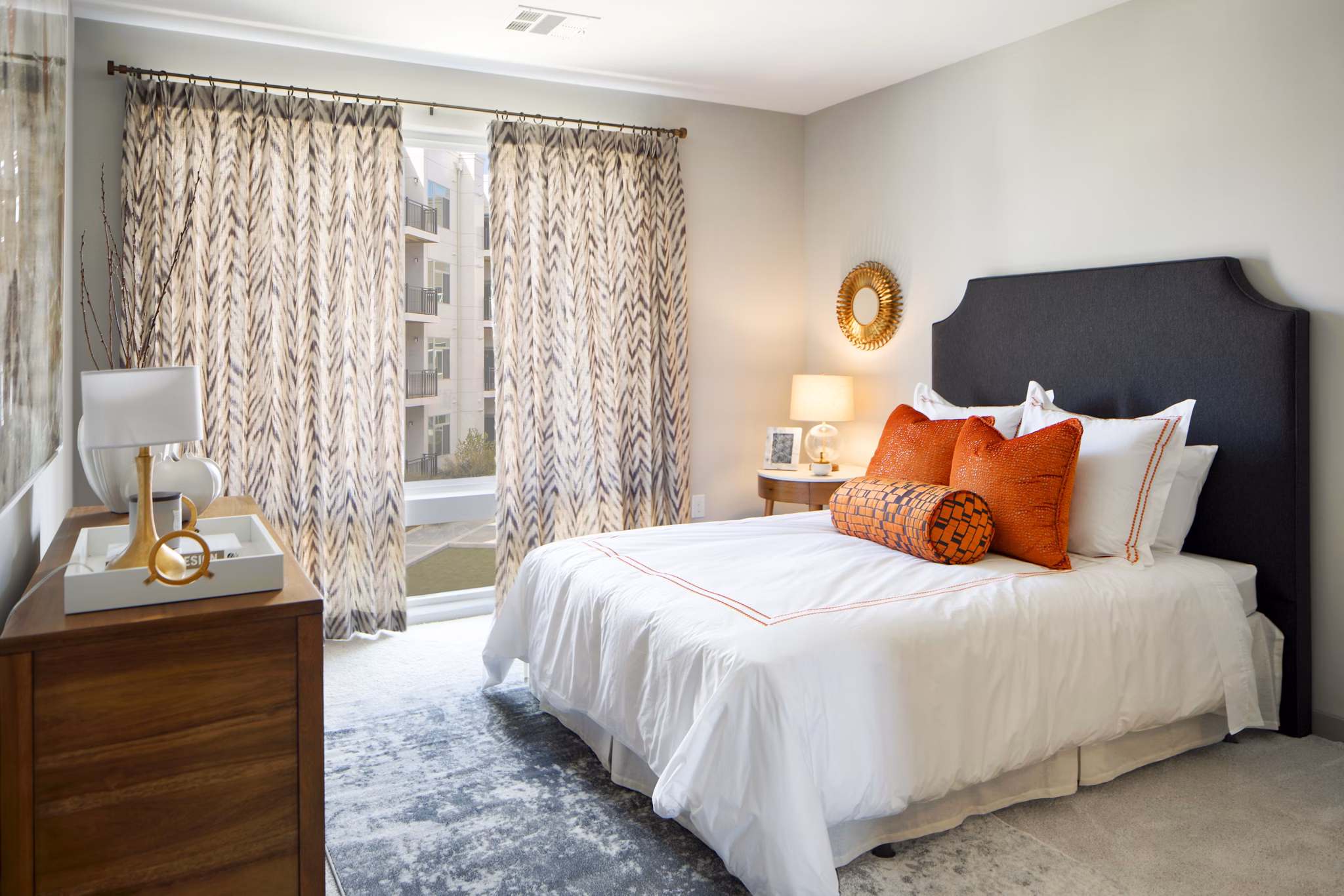 Modern bedroom with stylish decor at Indigo 301 Apartments