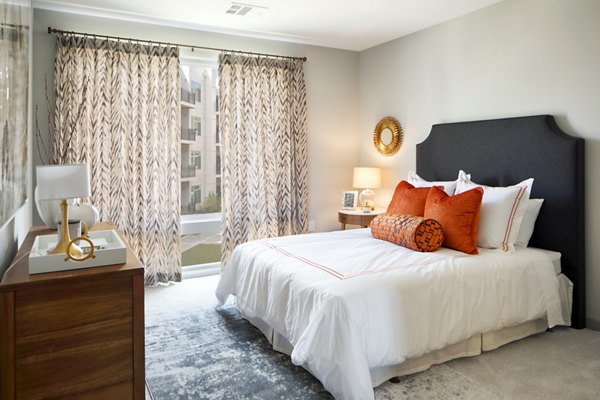 Modern bedroom with stylish decor at Indigo 301 Apartments