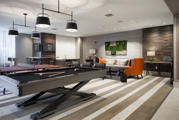 Modern clubhouse featuring lounge seating at Indigo 301 Apartments, luxury community lifestyle