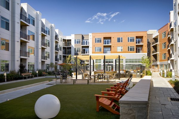 Courtyard with lush landscaping at Indigo 301 Apartments, luxury apartment community, enhancing relaxation and outdoor gathering spaces
