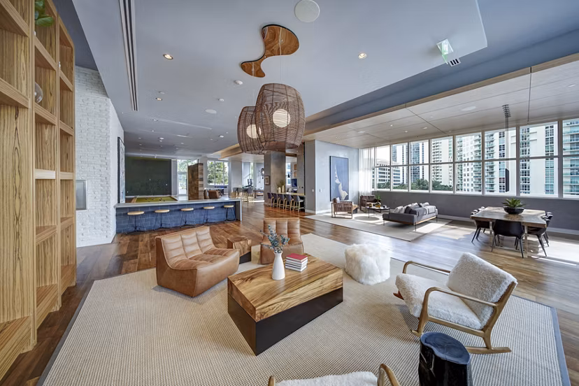 Clubhouse with elegant furnishings and modern decor at Alluvion Las Olas luxury apartments