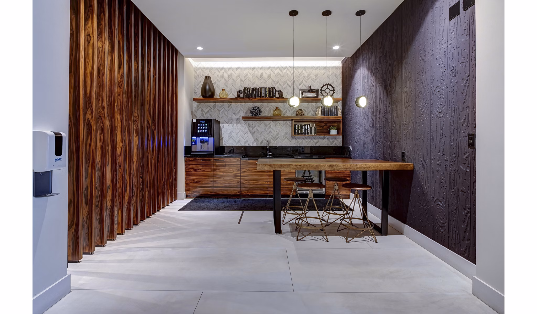 Clubhouse featuring modern design and chic furnishings at Alluvion Las Olas Apartments in Fort Lauderdale, promoting luxury living