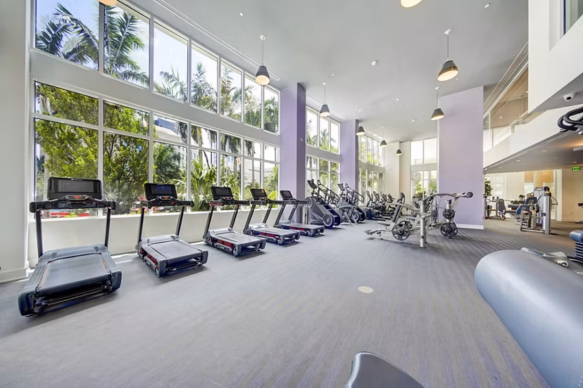 Modern fitness center with state-of-the-art equipment at Alluvion Las Olas Apartments