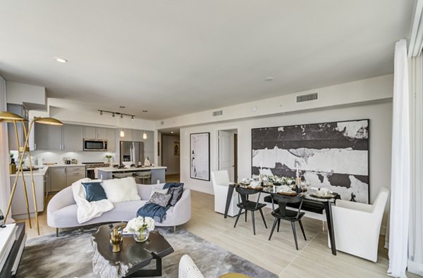 Spacious living area with modern furnishings in Alluvion Las Olas Apartments, ideal for luxury living near downtown amenities