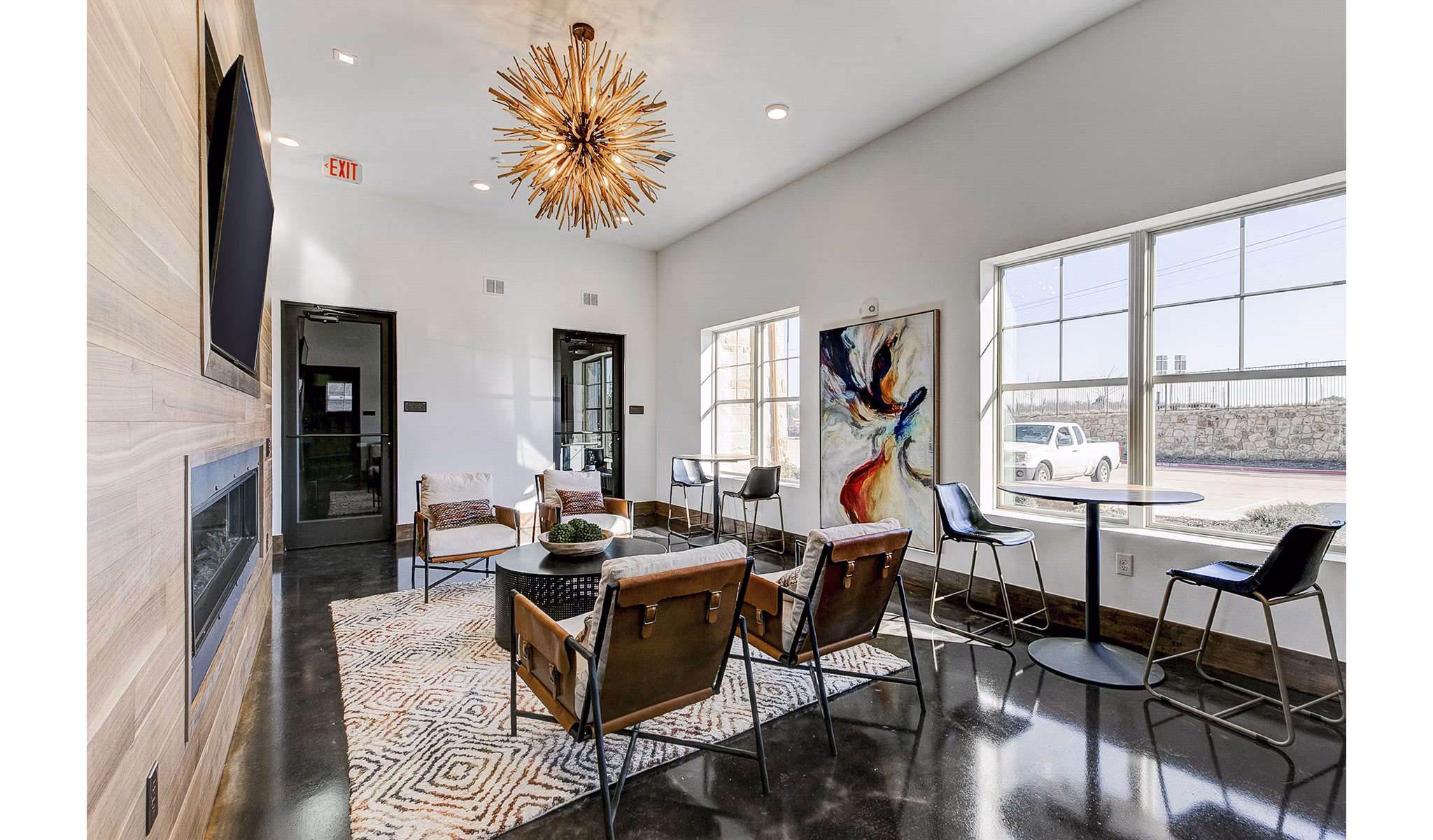 Elegant lobby with contemporary design at The Preserve luxury apartments, featuring high ceiling and modern furnishings in the clubhouse area