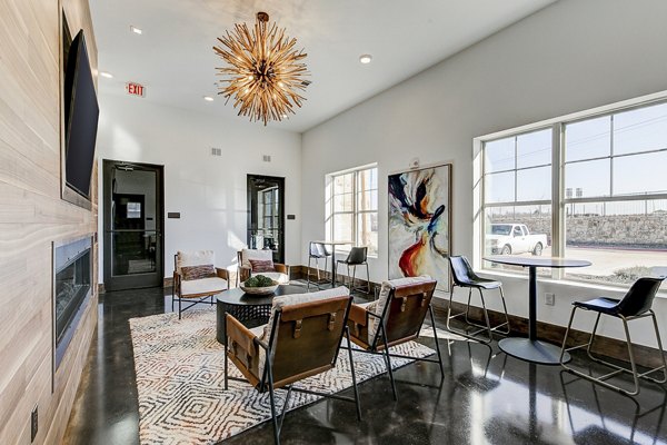 Elegant lobby with contemporary design at The Preserve luxury apartments, featuring high ceiling and modern furnishings in the clubhouse area