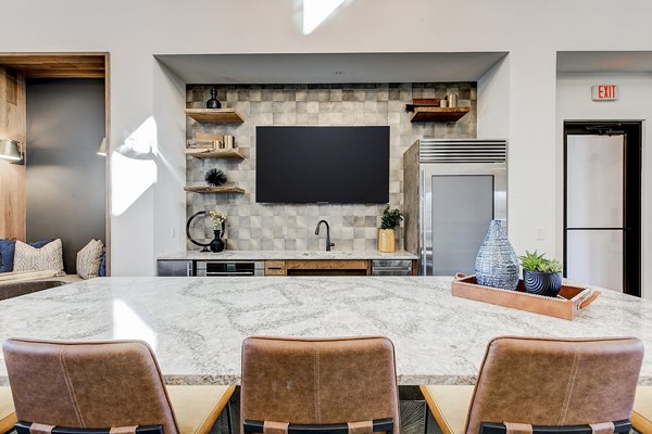 Clubhouse lobby featuring modern decor and plush seating at The Preserve apartments