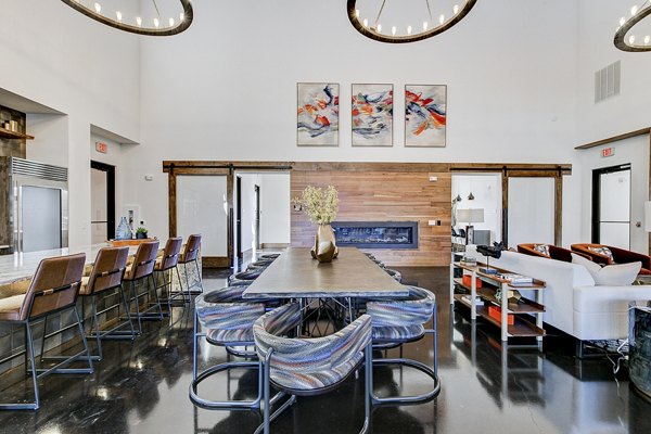 Luxe clubhouse lobby with elegant seating and lighting at The Preserve apartments
