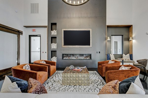 Clubhouse lobby showcasing modern design and elegant seating at The Preserve, luxury apartments by Greystar