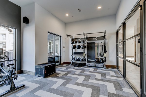 Modern fitness center with state-of-the-art equipment at The Preserve luxury apartments