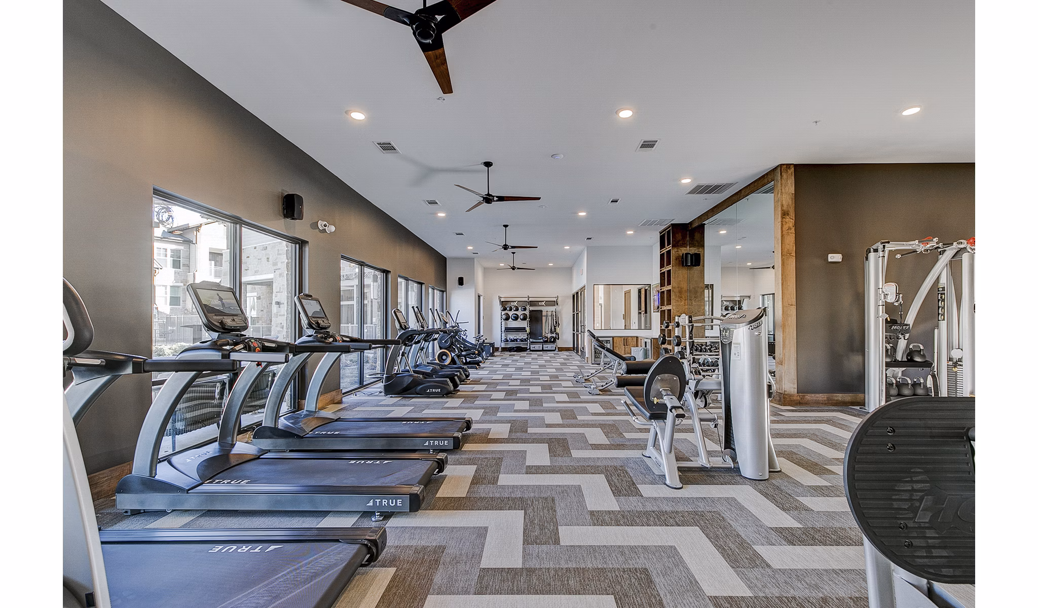 Modern fitness center with state-of-the-art equipment at The Preserve luxury apartments