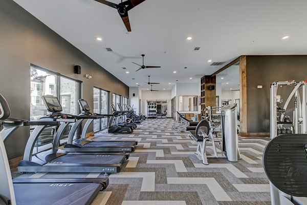 Modern fitness center with state-of-the-art equipment at The Preserve luxury apartments