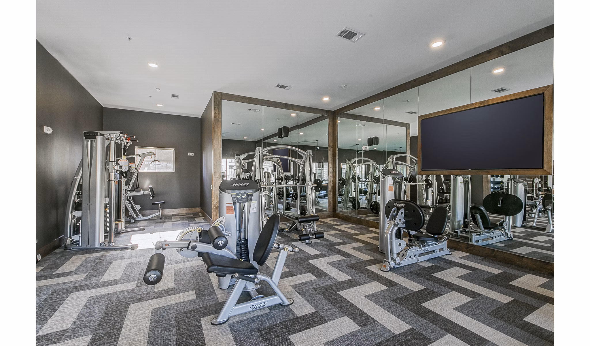 Modern fitness center with state-of-the-art equipment at The Preserve luxury apartments