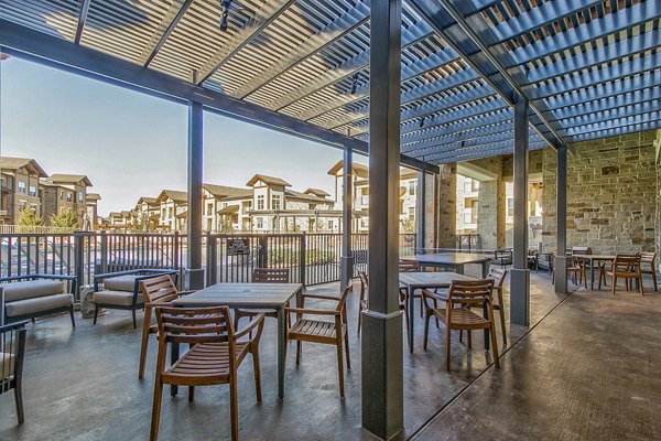 Private patio with elegant seating at The Preserve luxury apartments