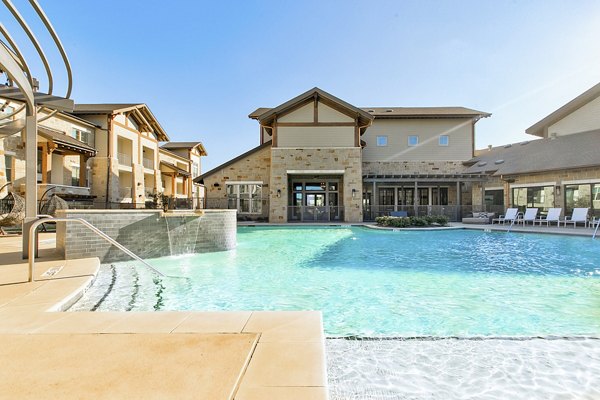 The Preserve: Luxury pool with scenic surroundings at Greystar's premier apartments