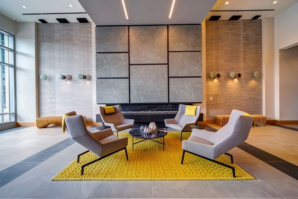 Clubhouse with modern decor at 511 Faye Apartments with space for gatherings and relaxation