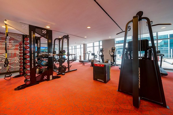 Fitness center with state-of-the-art equipment at 511 Faye Apartments offering a premium workout experience