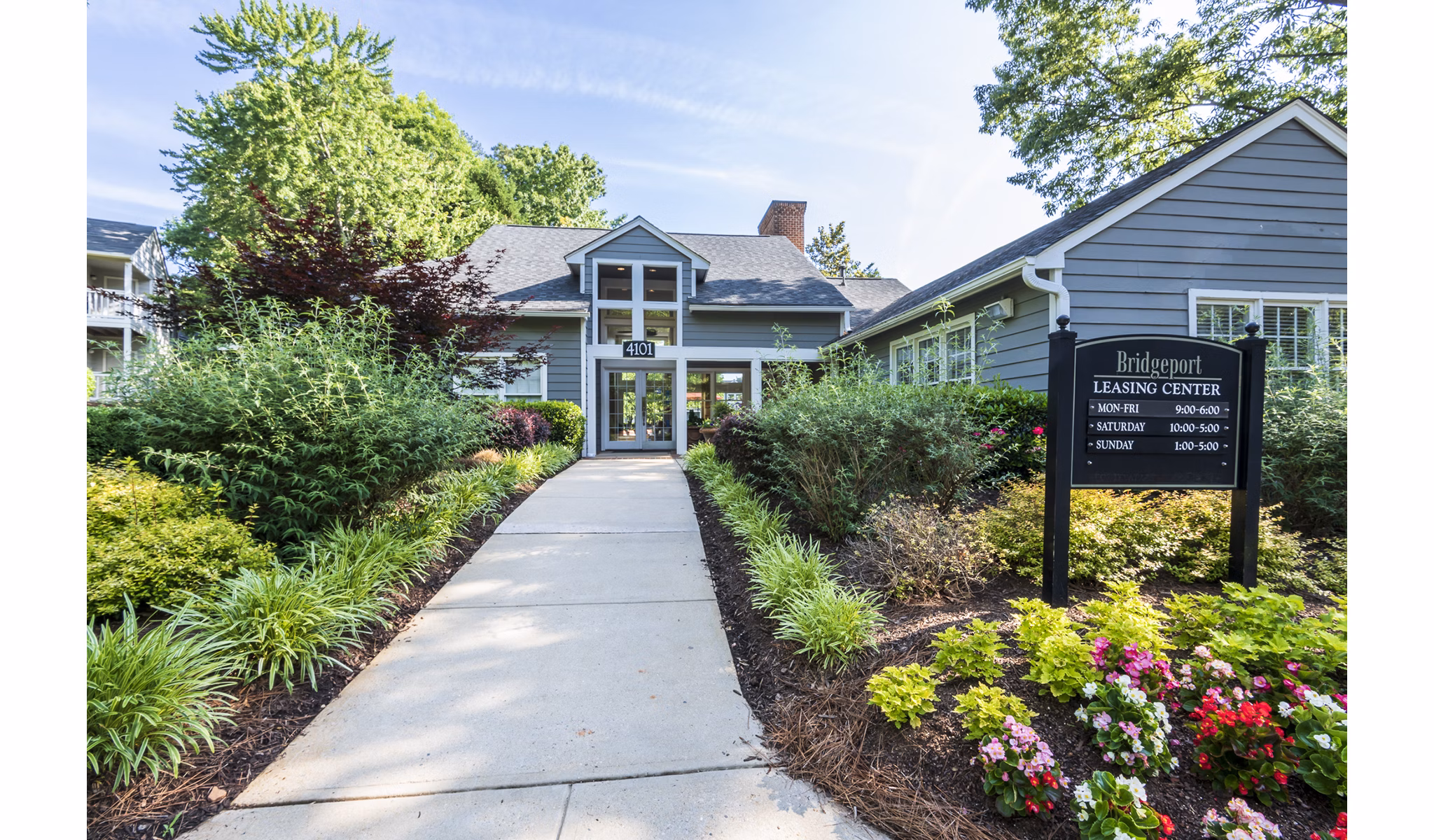 Modern clubhouse with cozy seating and fireplace at Bridgeport Apartments, luxury living in a vibrant community