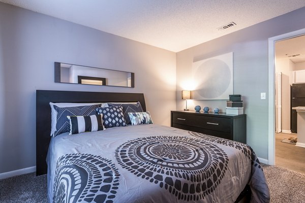 Cozy bedroom with contemporary dÃ©cor at Bridgeport Apartments