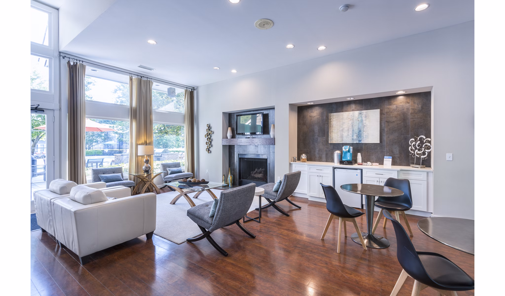 Clubhouse with modern design and seating at Bridgeport Apartments, offering luxury living spaces for social gatherings and events