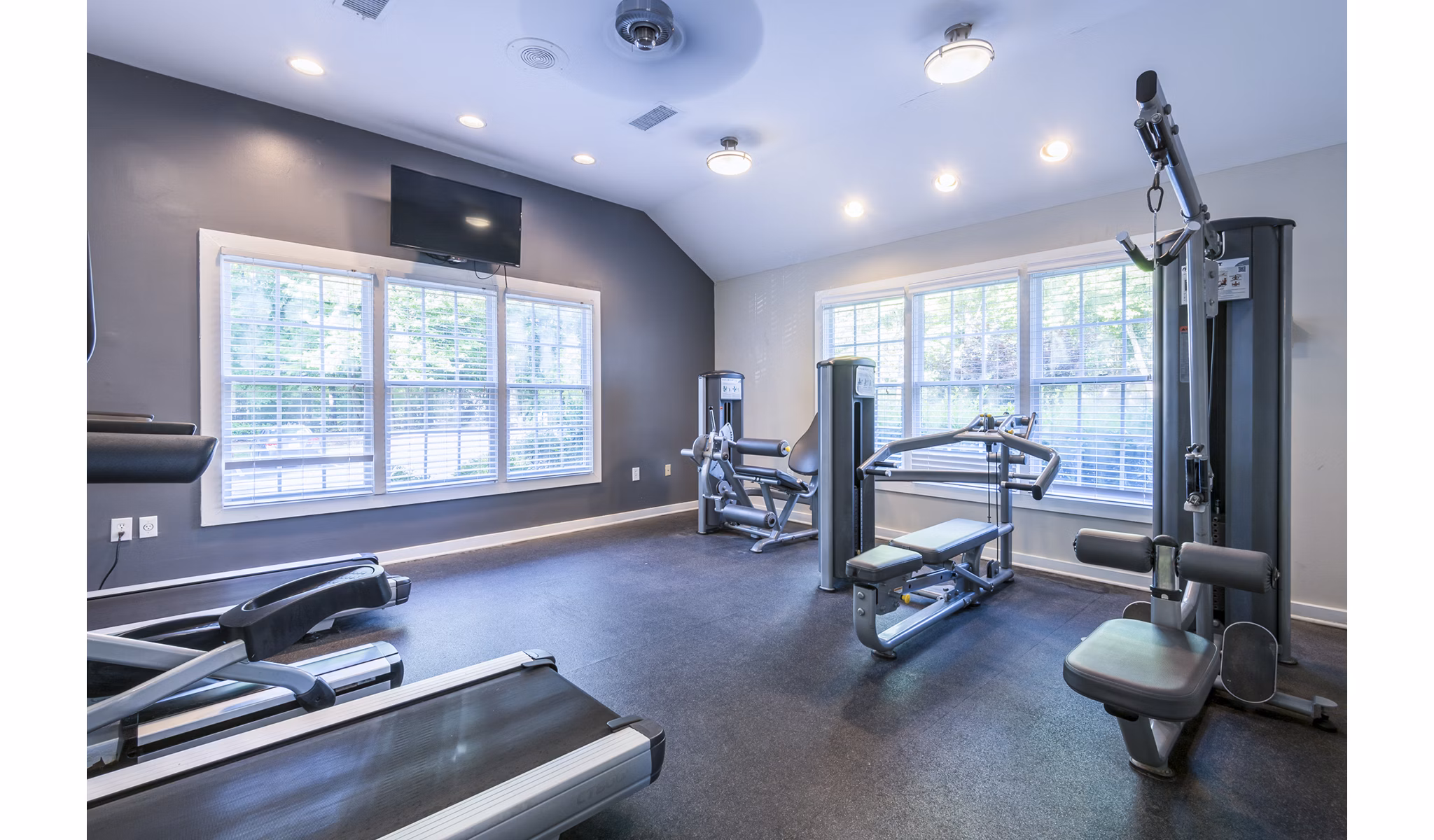 Modern fitness center with state-of-the-art equipment at Bridgeport Apartments: Luxury living by Greystar